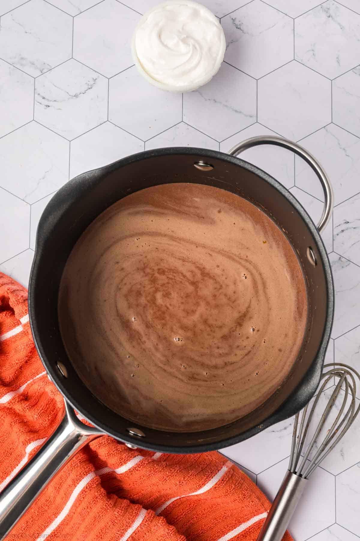 Hot chocolate mixture in a sauce pan