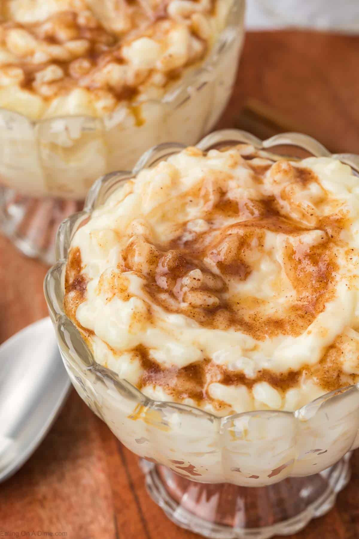 Rice pudding in clear serving dish topped with a brown sugar mixture