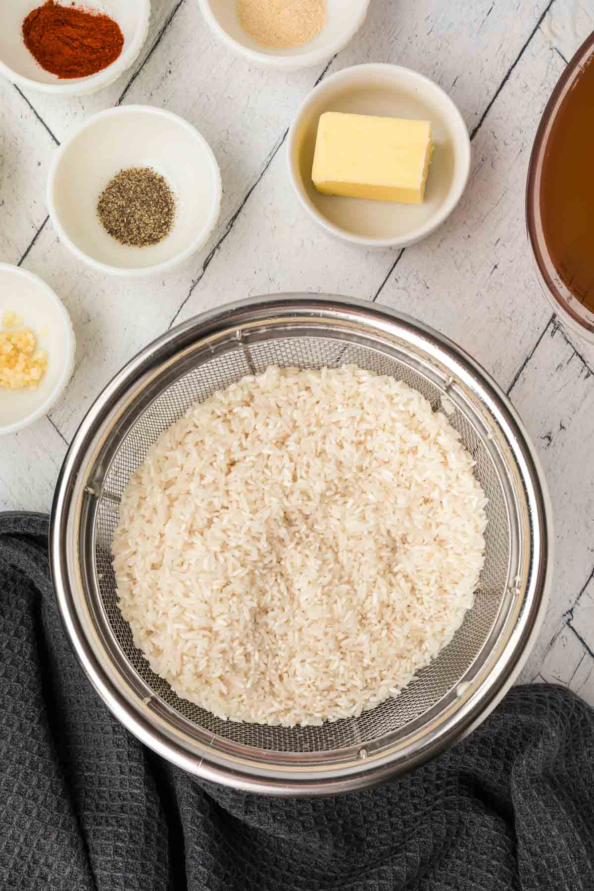 Rinse Rice in a colander