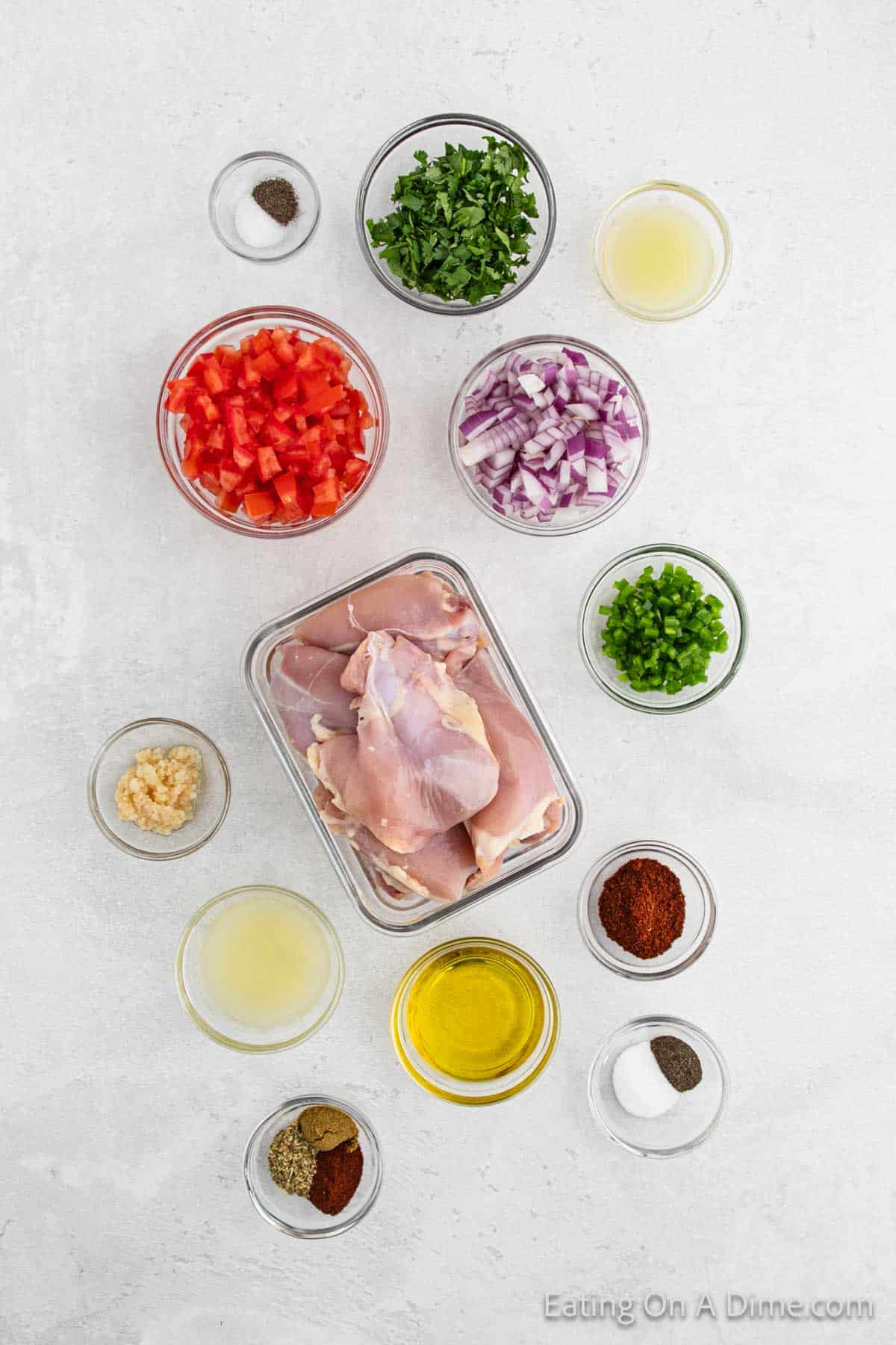 Ingredients - Chicken Thighs, olive oil, lime juice, garlic, chili powder, cumin, smoked paprika, oregano, salt, pepper, ripe tomatoes, jalapeno, cilantro, corn tortillas, crema, avocados