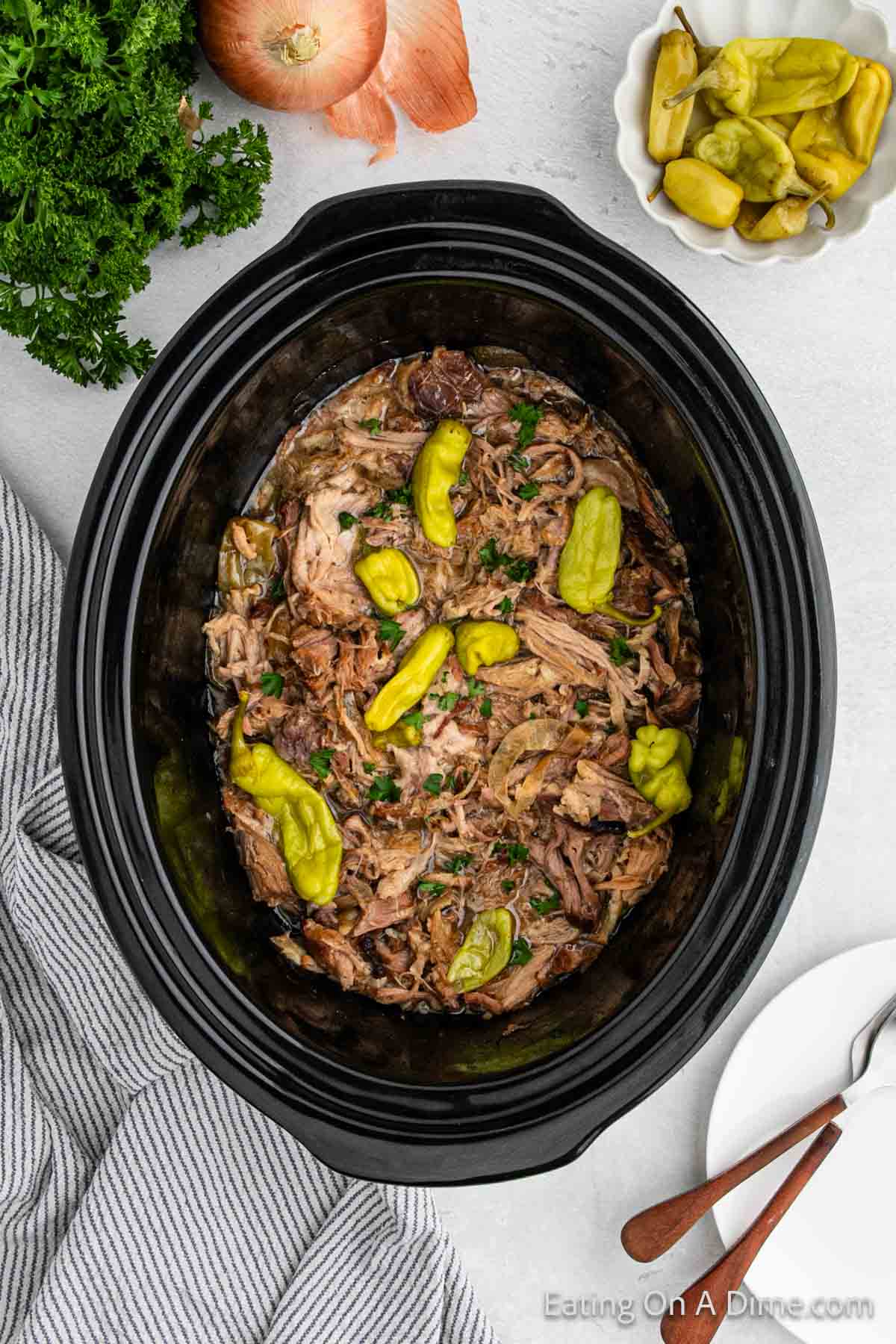 Shredded Pork Roast in the slow cooker with pepperoncini peppers