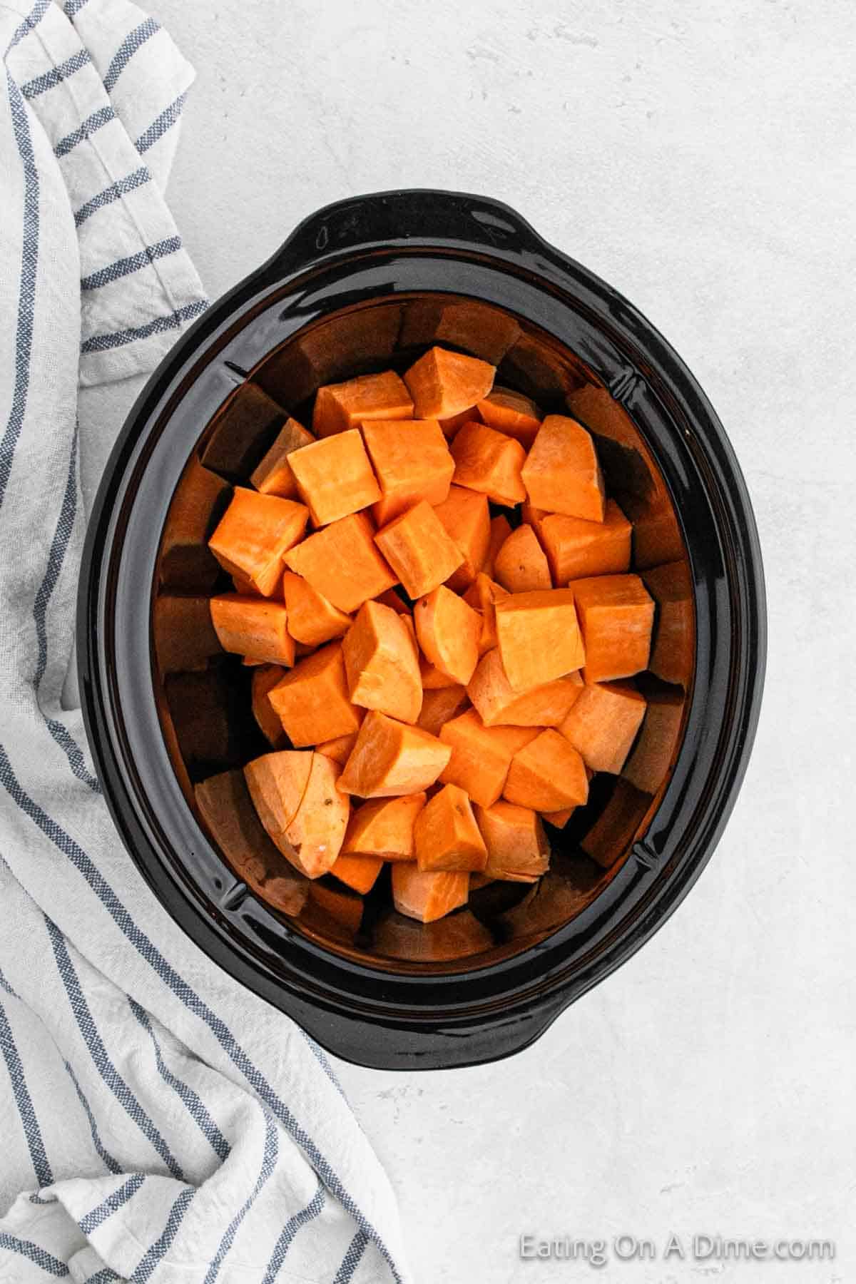 Large pieces of sweet potatoes in the slow cooker