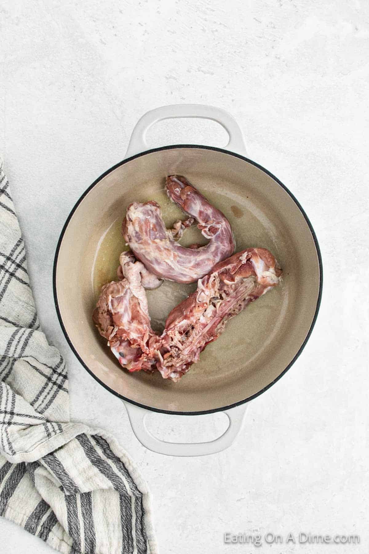 Turkey neck and backbone in a large stockpot