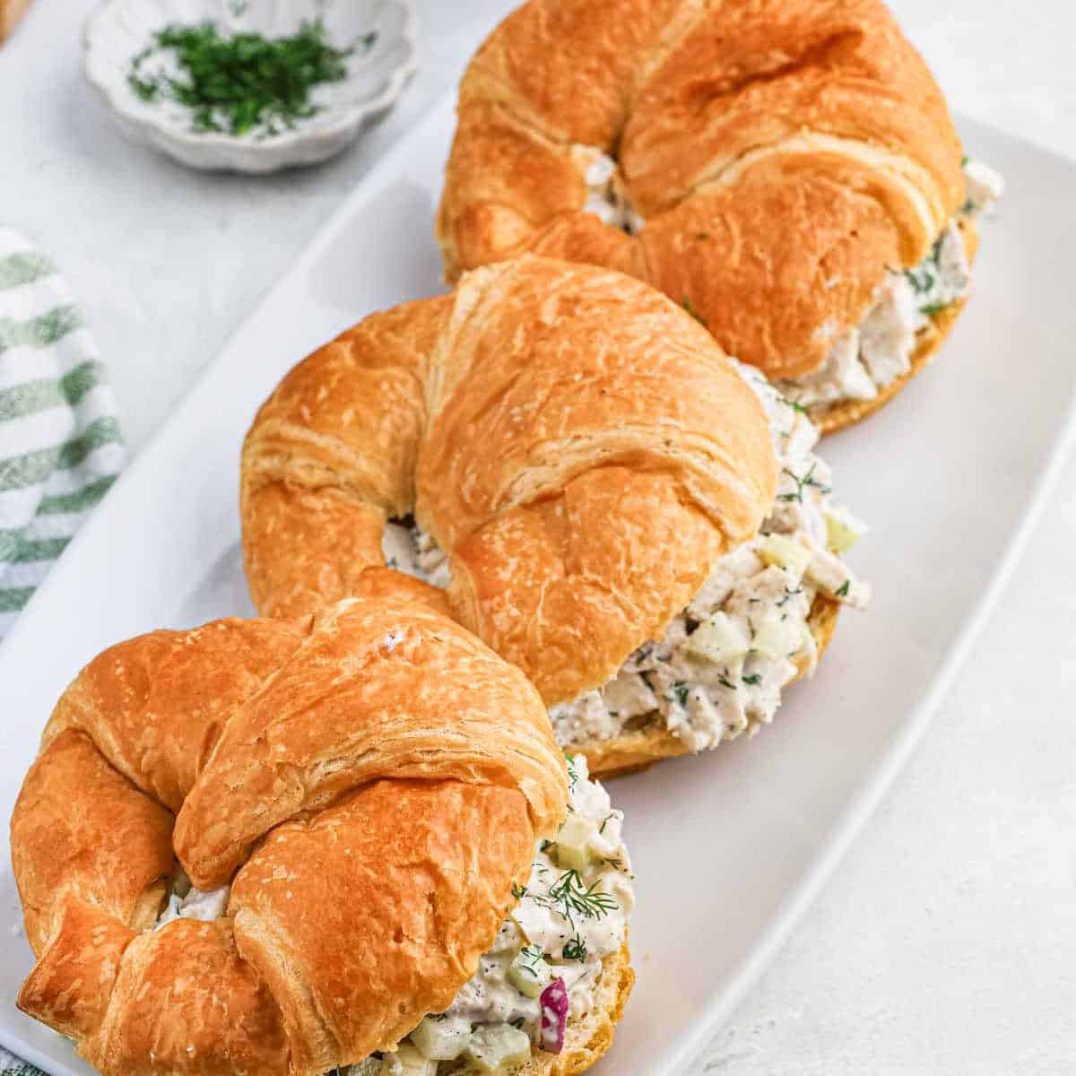 Croissant Sandwich with Turkey salad on a platter