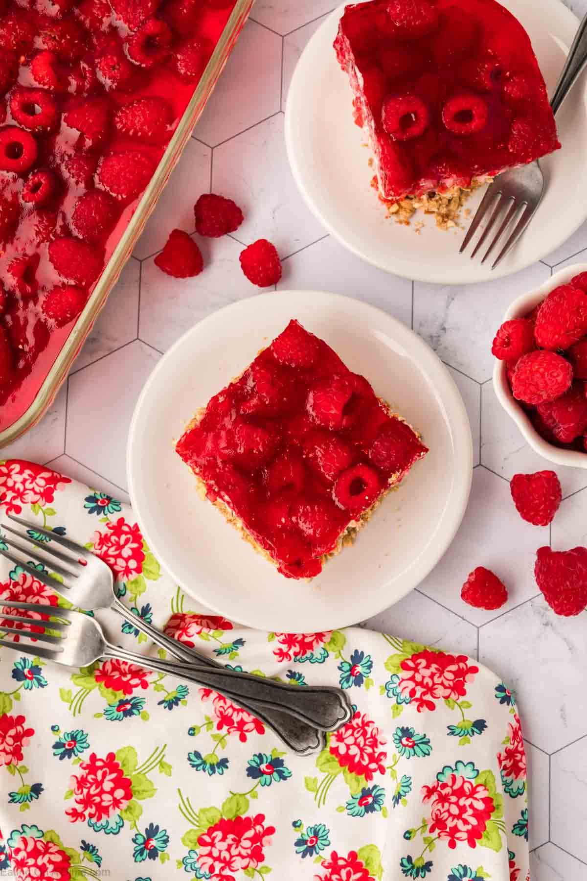 Raspberry Jello Pretzel Salad slice on a plate