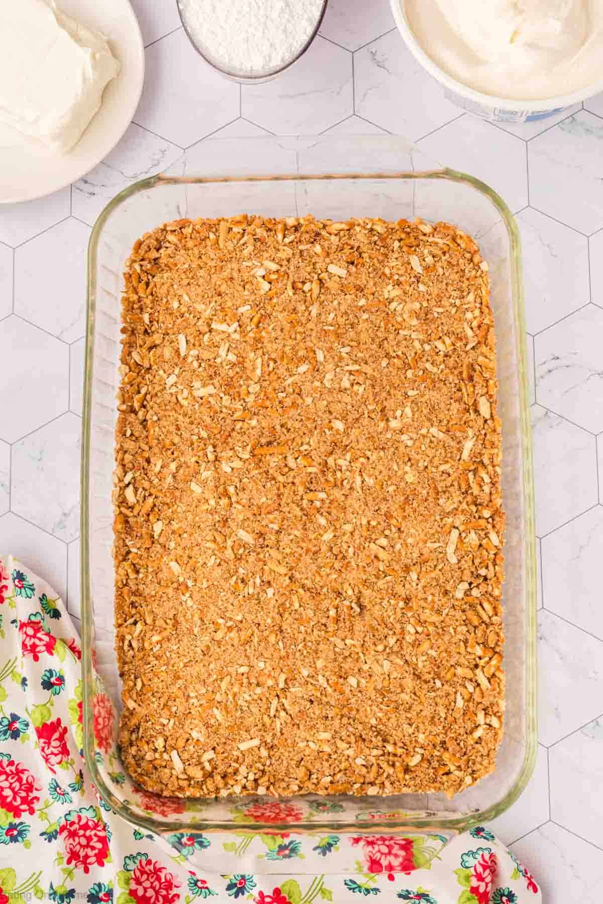 Crushed Pretzel Crust pressed into baking dish