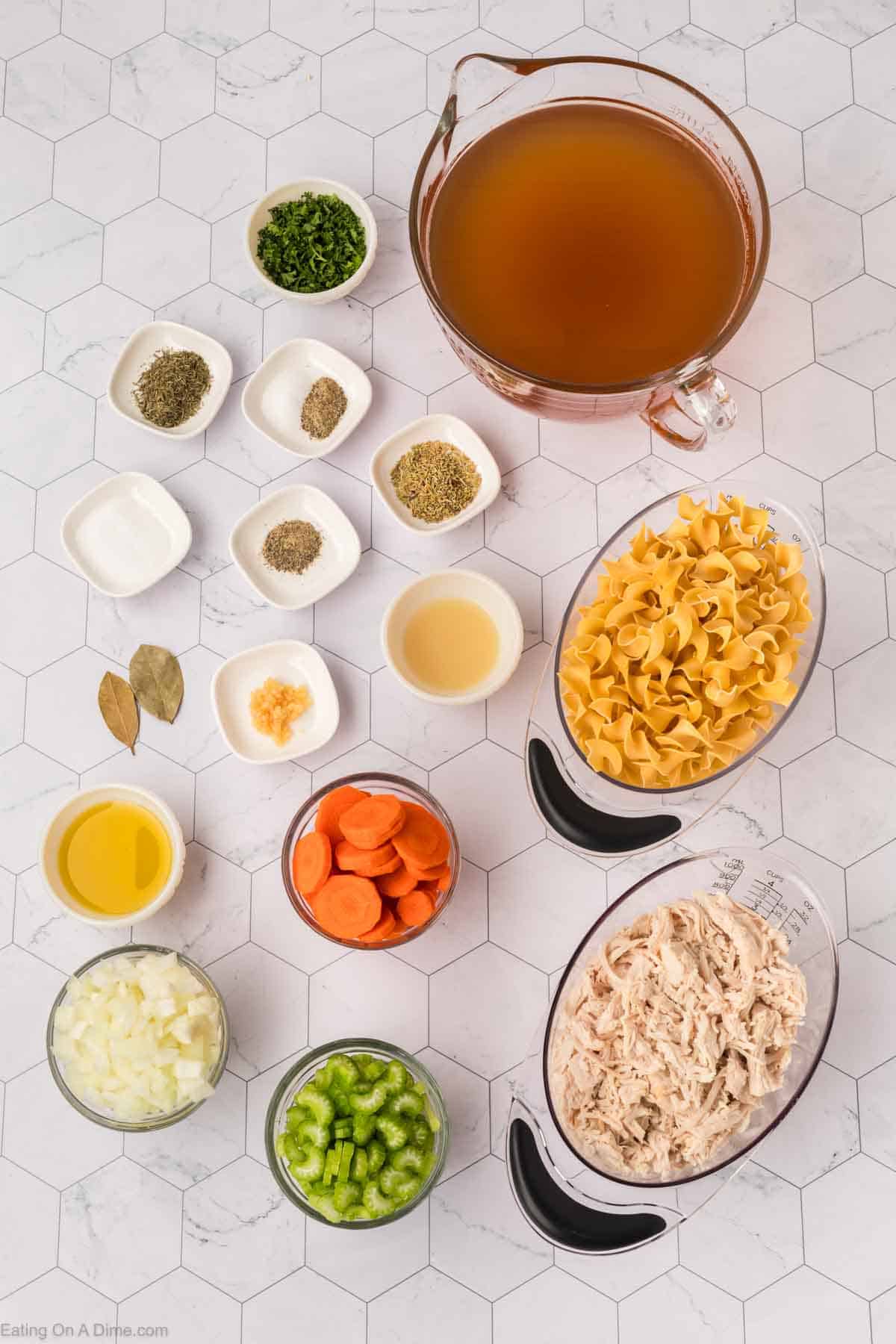 Ingredients - Vegetable oil, onion, celery, carrots, garlic, turkey broth, bay leaves, thyme, salt, rosemary, pepper, egg noodles, cooked turkey, salt and pepper, parsley, lemon juice