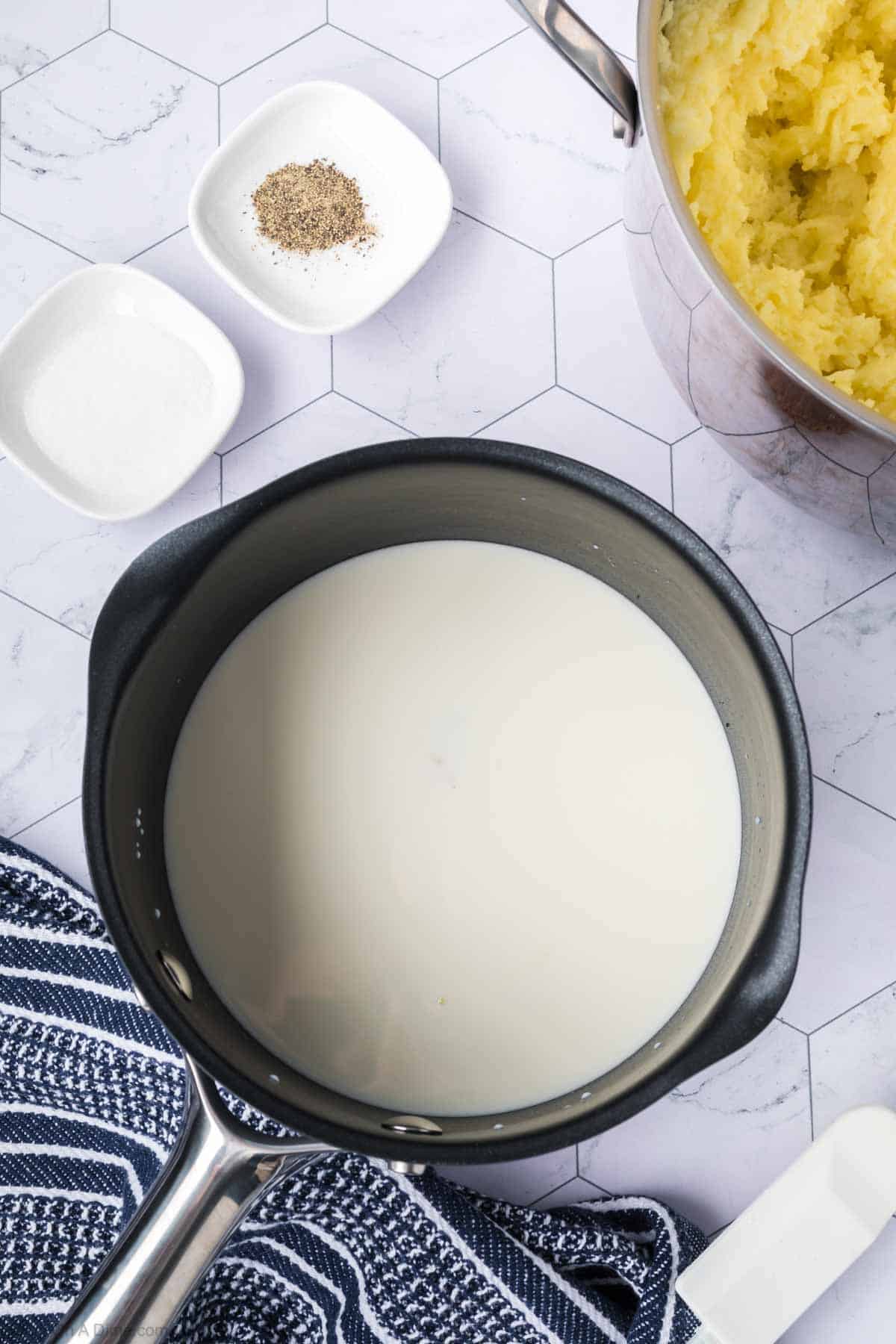 Milk and cream in a large saucepan