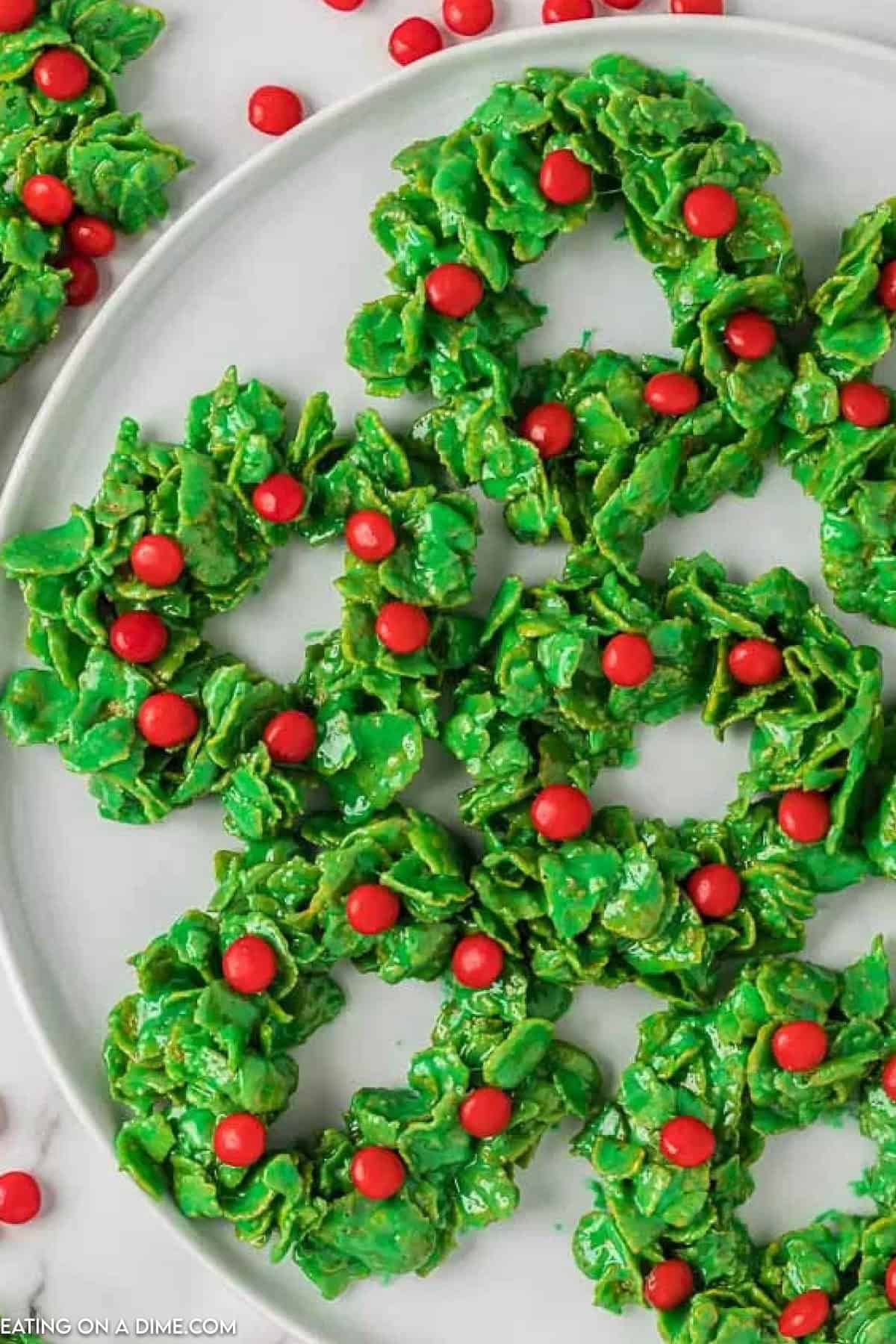 Green Christmas Wreath topped red candy and stacked on a plate