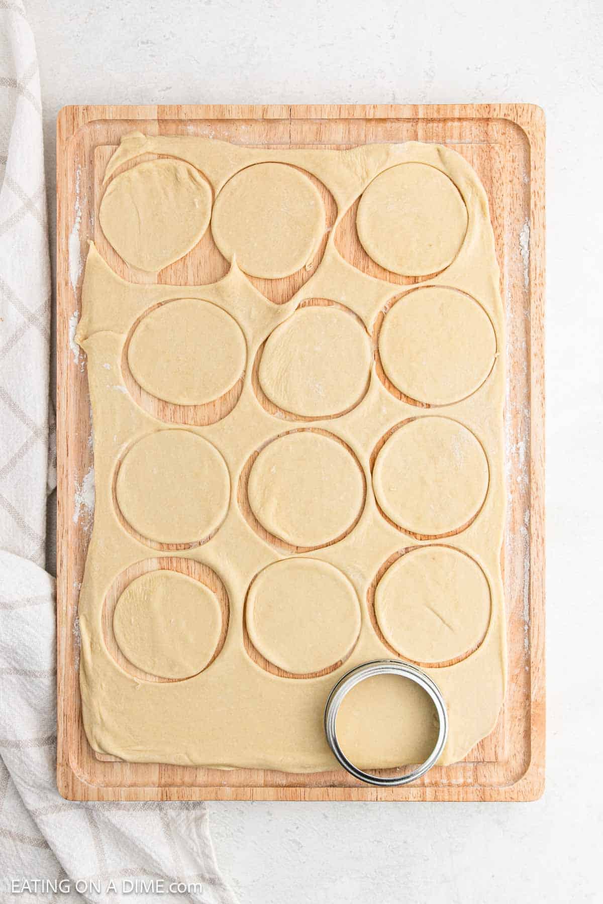 Dough cut into circles on a cutting board