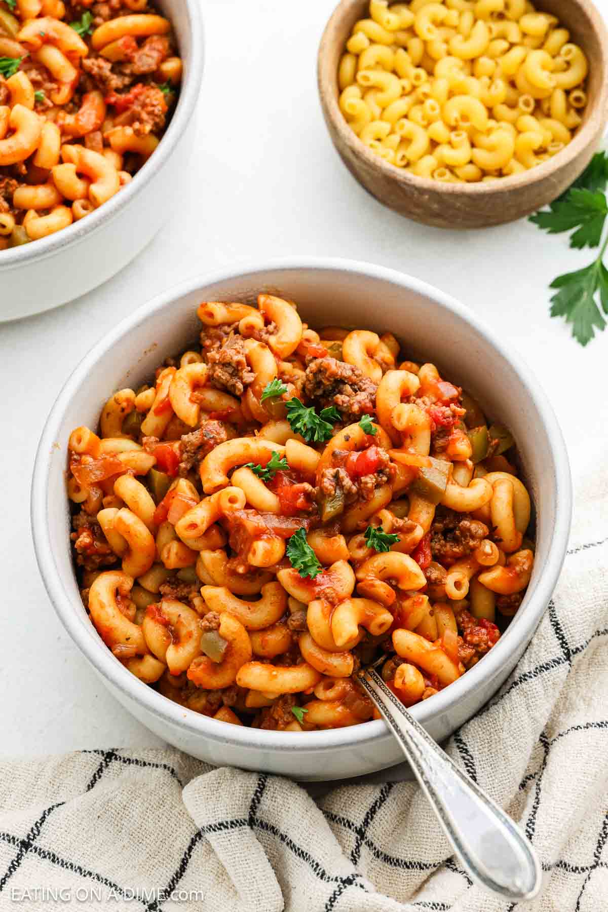 Bowls of Goulash with a spoon